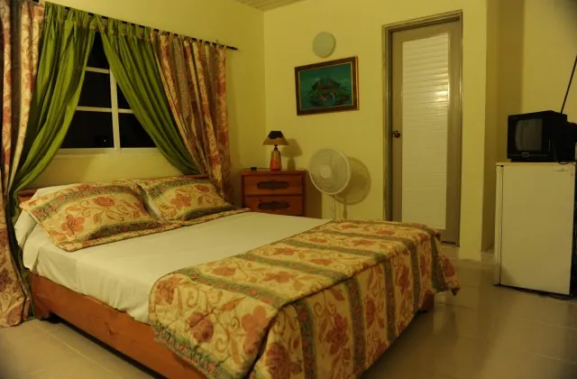 Hotel Taino Frontera Jimani room large bed